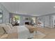 Large main bedroom with seating area, accent decor and a decorative fireplace at 703 E Horne St, Clayton, NC 27520