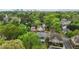An aerial view shows the homes and tree lined streets of this walkable community at 714 Mordecai Towne Pl, Raleigh, NC 27604