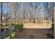 Spacious backyard with a privacy fence and mature trees at 746 Wickham Ridge Rd, Apex, NC 27539