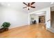 Open-concept living space with hardwood floors and natural light at 746 Wickham Ridge Rd, Apex, NC 27539
