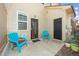 Charming patio with colorful chairs and dual entrances at 746 Wickham Ridge Rd, Apex, NC 27539