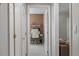 Hallway view into a home office with white chair and desk at 807 Clean View Ct, Fuquay Varina, NC 27526