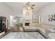 Bright living room with a fireplace, vaulted ceiling, and open layout, creating an inviting atmosphere at 807 Clean View Ct, Fuquay Varina, NC 27526