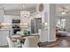 Open floor plan with a kitchen, dining area and living space connected, allowing for easy entertaining at 807 Clean View Ct, Fuquay Varina, NC 27526