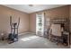 Office with exercise equipment, desk, and window with natural light at 807 Clean View Ct, Fuquay Varina, NC 27526
