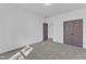 A bedroom features neutral carpet and a closet at 858 Lake Artesia Ln, Fuquay Varina, NC 27526