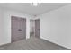 A bedroom features neutral carpet and a closet at 858 Lake Artesia Ln, Fuquay Varina, NC 27526