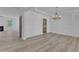 Open floor plan dining room, showcasing modern trim and a chandelier at 858 Lake Artesia Ln, Fuquay Varina, NC 27526