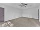 The primary bedroom has a trey ceiling and ceiling fan at 858 Lake Artesia Ln, Fuquay Varina, NC 27526