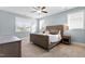 Calm primary bedroom with neutral decor, natural light, and carpet flooring creating a serene retreat at 905 Moye Dr, Raleigh, NC 27606