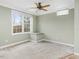 Cozy bedroom includes a window nook, carpeted floors, and natural light at 9220 Meadow Mist Ct, Raleigh, NC 27617