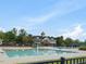 Large community pool and clubhouse providing a social and recreational hub for residents at 9220 Meadow Mist Ct, Raleigh, NC 27617