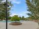 Inviting community pool area with ample seating and well-maintained landscaping, perfect for relaxation at 9220 Meadow Mist Ct, Raleigh, NC 27617