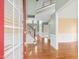 Inviting foyer features hardwood floors, high ceilings, and a staircase leading to the second floor at 9220 Meadow Mist Ct, Raleigh, NC 27617