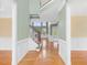 Spacious foyer featuring hardwood floors, staircase, and elegant trim work, offering a glimpse into the home's design at 9220 Meadow Mist Ct, Raleigh, NC 27617