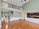 Spacious living room boasts hardwood floors, abundant natural light, and open floor plan to the kitchen at 9220 Meadow Mist Ct, Raleigh, NC 27617