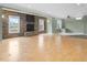 Spacious living room boasts a stone fireplace and natural light from large windows at 9220 Meadow Mist Ct, Raleigh, NC 27617
