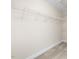 Spacious walk-in closet with ample shelving for organized storage solutions at 9220 Meadow Mist Ct, Raleigh, NC 27617
