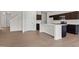 Spacious kitchen with dark cabinetry, an island, stainless steel appliances, and recessed lighting at 4867 Pioneer Dr, Sanford, NC 27330