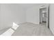 Bright bedroom featuring neutral carpet, fresh paint and access to an ensuite bathroom at 103 Gladstone Loop, Clayton, NC 27520