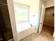 Bathroom with soaker tub and chrome fixtures at 107 Southern Estates Dr, Sanford, NC 27330
