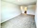 This bedroom opens up to another room at 107 Southern Estates Dr, Sanford, NC 27330