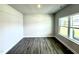 Bedroom featuring luxury vinyl plank flooring and natural light at 107 Southern Estates Dr, Sanford, NC 27330
