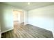 Open living space with luxury vinyl plank flooring and natural light at 107 Southern Estates Dr, Sanford, NC 27330