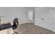Bright bedroom with neutral walls, plush carpeting, and a convenient closet and adjoining room at 1136 Remey Ave, Wake Forest, NC 27587