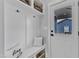Inviting mudroom features a bench, storage, and convenient hooks, perfect for organizing outerwear and accessories at 1136 Remey Ave, Wake Forest, NC 27587