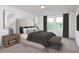 Bedroom with neutral colors and furnishings, large windows, and ample natural light at 1137 Solace Way, Rolesville, NC 27571