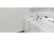 Efficient laundry room with a full-size washer and dryer for convenient chores at 1137 Solace Way, Rolesville, NC 27571