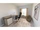 Comfortable office space with sleek desk, comfortable chair, and natural light at 1137 Solace Way, Rolesville, NC 27571