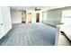 Spacious bonus room featuring neutral paint, plush carpeting, and natural light at 119 Southern Estates Dr, Sanford, NC 27330