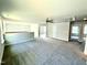 Expansive bonus room with soft carpeting, abundant natural light, and versatile layout at 119 Southern Estates Dr, Sanford, NC 27330