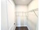 Walk-in closet features shelving, carpeting, and neutral paint at 119 Southern Estates Dr, Sanford, NC 27330