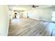 Open-concept living space featuring a kitchen, dining area, and living room at 119 Southern Estates Dr, Sanford, NC 27330