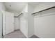 Walk-in closet with ample hanging storage and carpeted floor at 132 N Keatts Winner Ct, Wilson's Mills, NC 27520