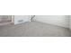 Unfinished basement features gray carpet, offering a blank canvas for your dream space at 133 N Keatts Winner Ct, Wilson's Mills, NC 27520