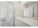 Clean and bright bathroom with white cabinets, sleek countertops, and modern fixtures at 133 N Keatts Winner Ct, Wilson's Mills, NC 27520