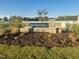 Stone-clad welcome sign for Wilson's Walk community, featuring lush landscaping and a serene setting at 133 N Keatts Winner Ct, Wilson's Mills, NC 27520