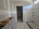 Unfinished bathroom featuring vanity, closet, and a new shower stall at 143 Mildred Place, Broadway, NC 27505