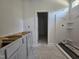 Bathroom featuring a new shower and space for cabinets, ready for personalization at 143 Mildred Place, Broadway, NC 27505