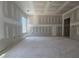 Bedroom with drywall, concrete floors, and a window at 143 Mildred Place, Broadway, NC 27505