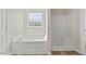 Bathroom featuring separate soaking tub and shower at 16 Monarch Trl, Selma, NC 27576