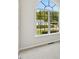Bedroom with a large arched window and neutral carpeting at 16 Monarch Trl, Selma, NC 27576