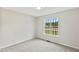 Comfortable bedroom with neutral paint and plush carpeting at 16 Monarch Trl, Selma, NC 27576