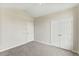 Neutral bedroom features closet and neutral carpeting at 16 Monarch Trl, Selma, NC 27576