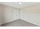 Bright bedroom featuring neutral paint, plush carpeting, and closet at 16 Monarch Trl, Selma, NC 27576