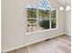 Inviting dining area featuring hardwood flooring and natural light at 16 Monarch Trl, Selma, NC 27576